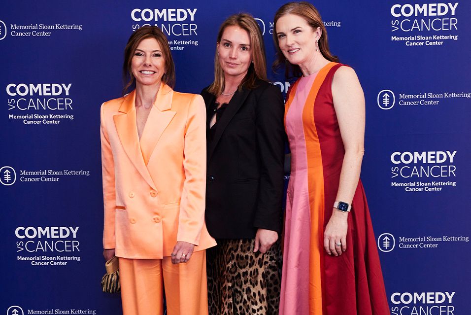 Erin Junkin standing between Comedy vs Cancer co-founders Niccole Kroll and Jennifer Rogers Carlock.